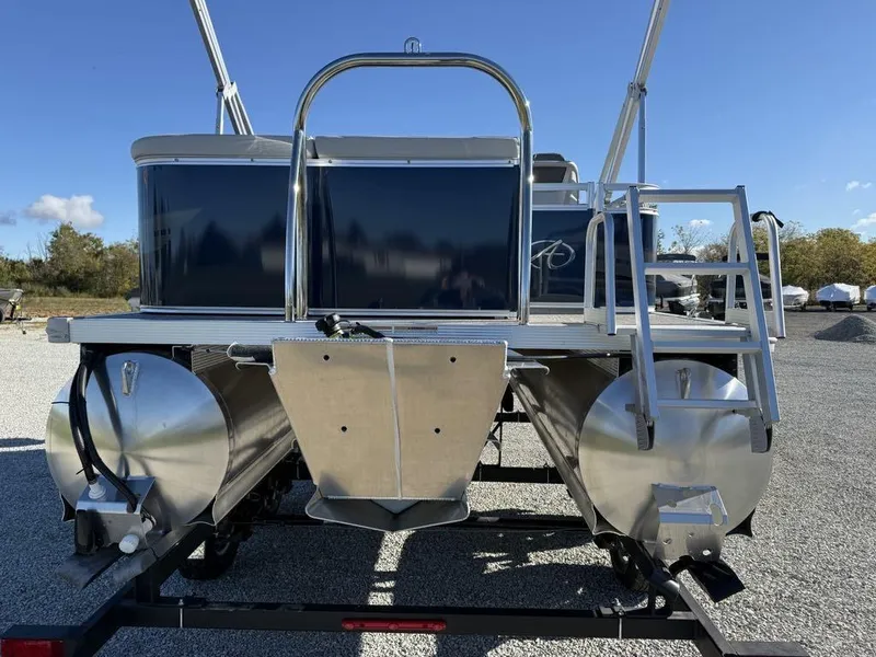 Slide: The Image of 2024 Avalon Venture Cruise Bow Fish pontoon boat, rear view on trailer. - 3