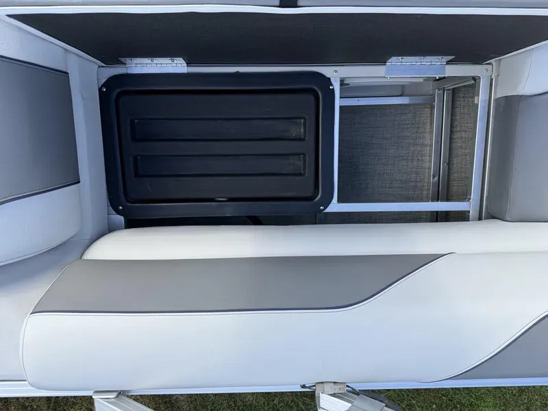 Slide: The Image of 2024 Avalon Venture Cruise Bow Fish boat seating with storage compartment. - 8