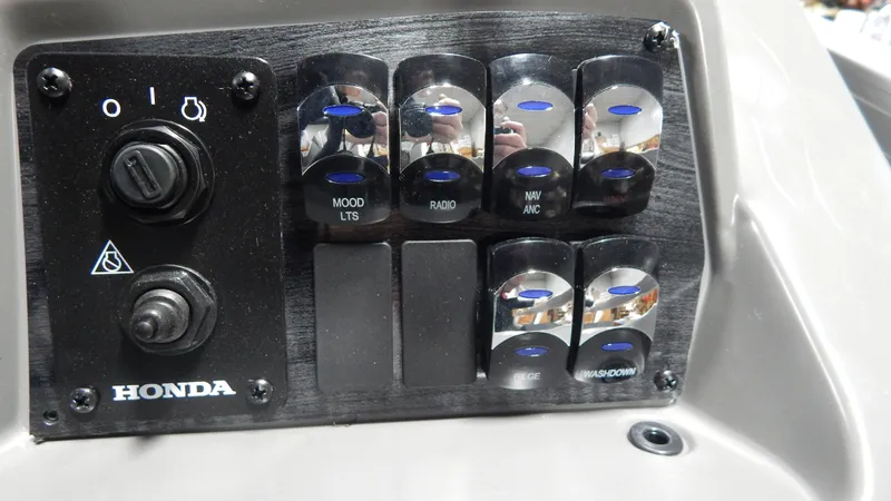 Slide: The Image of Control panel of 2024 Avalon Venture Cruise Rear Bench 23' with Honda switches. - 9