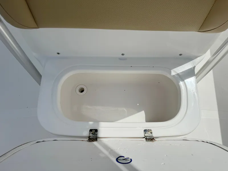 Slide: The Image of Livewell compartment on a 2021 NauticStar 2302 Legacy boat. - 13