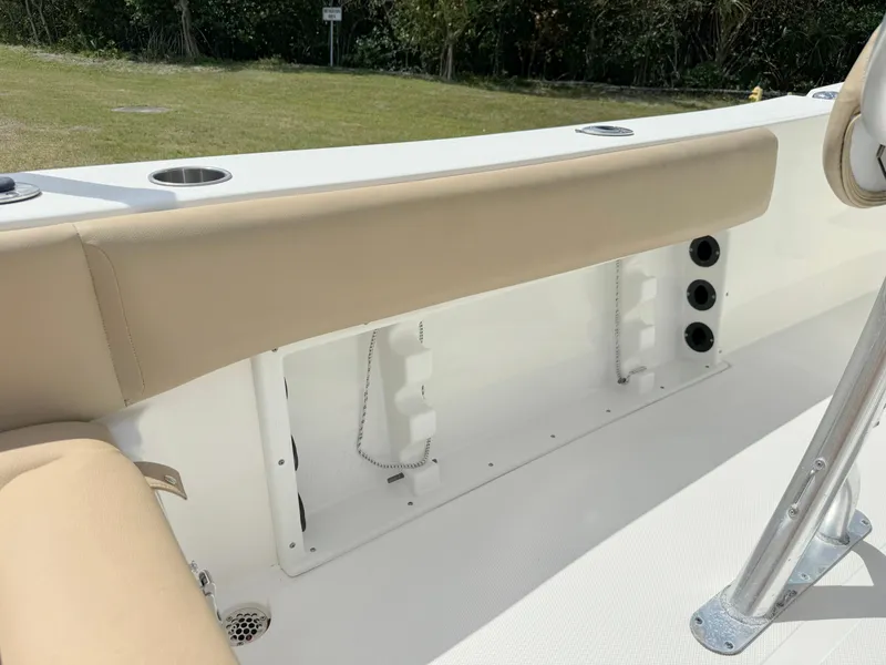 Slide: The Image of Interior seating and storage of a 2021 NauticStar 2302 Legacy boat. - 27