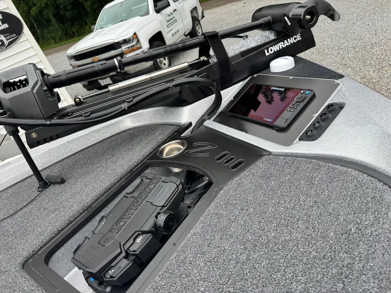 Slide: The Image of 2024 Ranger Z519C boat dashboard with Lowrance electronics and Minn Kota trolling motor. - 7