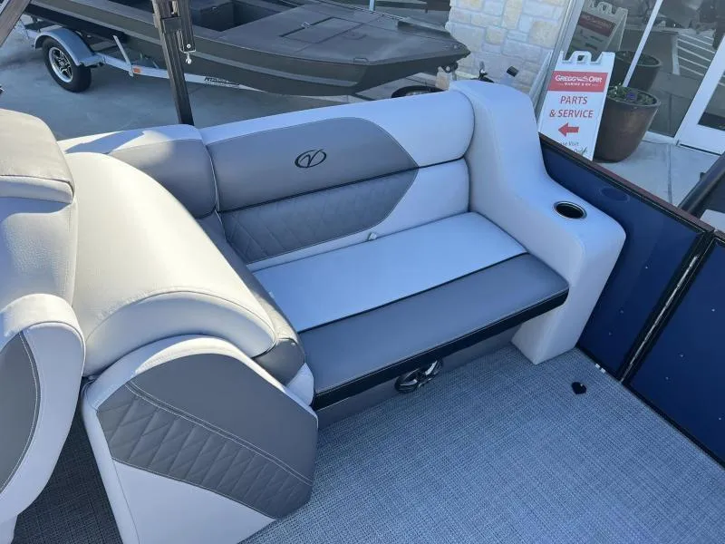 Slide: The Image of 2024 Veranda VISTA VIEW 22RC boat interior seating with gray upholstery. - 11