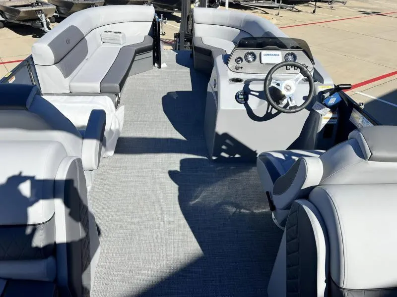 Slide: The Image of 2024 Veranda VISTA VIEW 22RC pontoon boat interior with gray seating and steering console. - 12