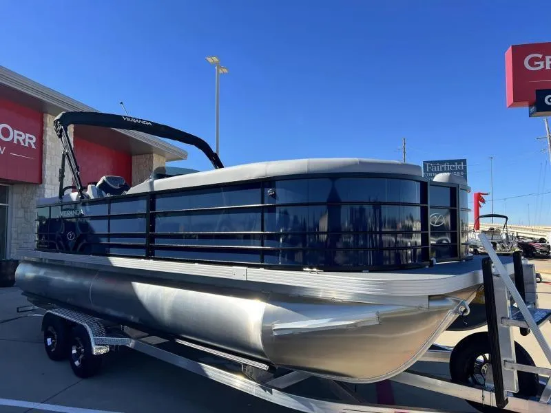 Slide: The Image of 2024 Veranda VISTA VIEW 22RC pontoon boat on a trailer outside a dealership. - 7