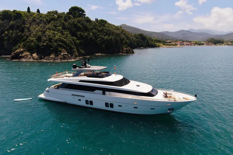 Slide: The Image of Sanlorenzo SL96 2016 yacht cruising near a scenic coastline. - 1