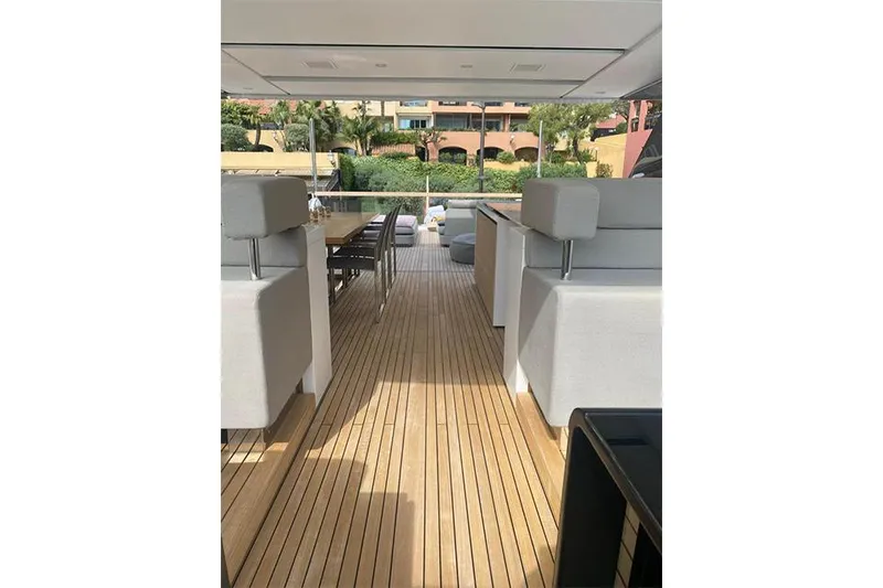 Slide: The Image of 2016 Sanlorenzo SL96 yacht deck with modern seating and wooden flooring. - 11