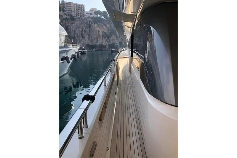 Slide: The Image of Side deck view of 2016 Sanlorenzo SL96 yacht in a marina. - 12