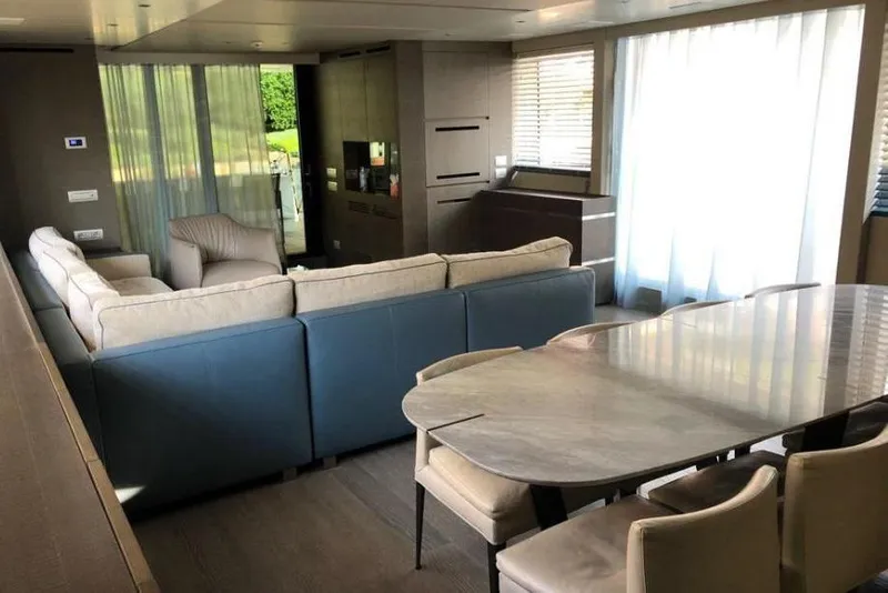 Slide: The Image of Luxurious interior of 2016 Sanlorenzo SL96 yacht with modern dining and living area. - 15