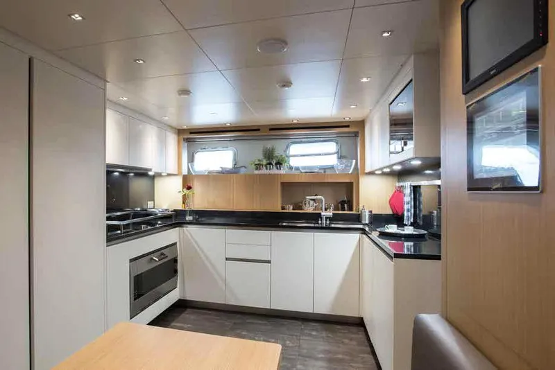 Slide: The Image of Modern kitchen interior of 2016 Sanlorenzo SL96 yacht with sleek cabinetry and appliances. - 18