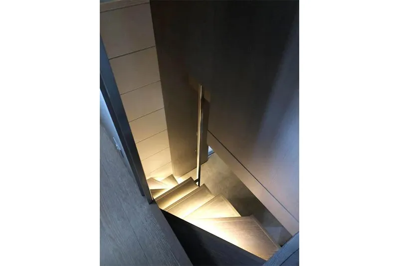 Slide: The Image of Modern staircase with ambient lighting on a 2016 Sanlorenzo SL96 yacht. - 20