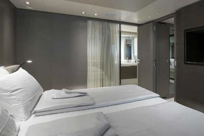 Slide: The Image of Luxurious bedroom on the 2016 Sanlorenzo SL96 yacht with modern decor and ensuite bathroom. - 25