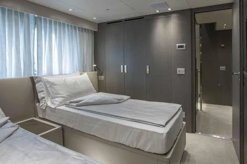 Slide: The Image of Modern bedroom interior on 2016 Sanlorenzo SL96 yacht with twin beds and sleek design. - 26