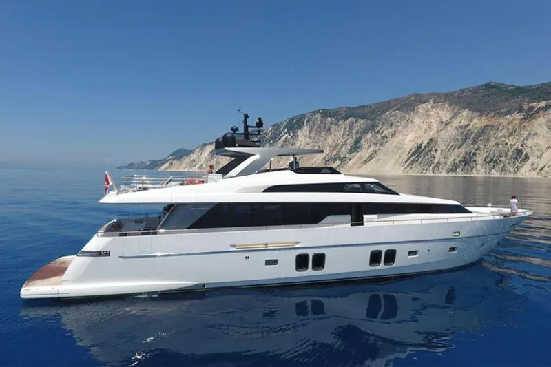 Slide: The Image of Sanlorenzo SL96 2016 yacht cruising near rocky coastline. - 4