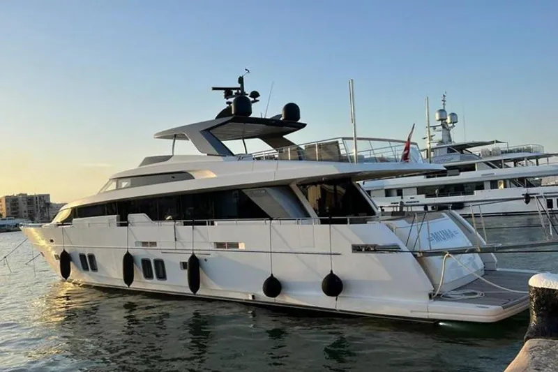 Slide: The Image of 2016 Sanlorenzo SL96 yacht docked at sunset. - 5