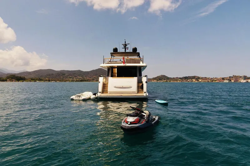 Slide: The Image of Sanlorenzo SL96 2016 yacht with jet ski and inflatables on calm water. - 6