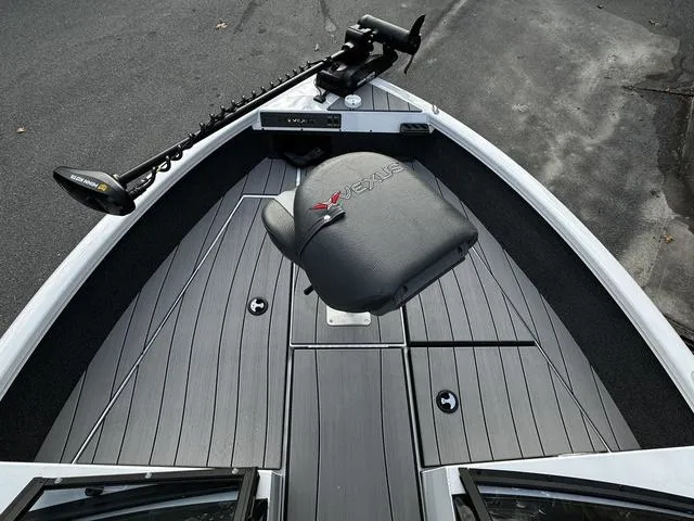 Slide: The Image of 2024 Vexus ADX180 boat with advanced seating and fishing equipment. - 10