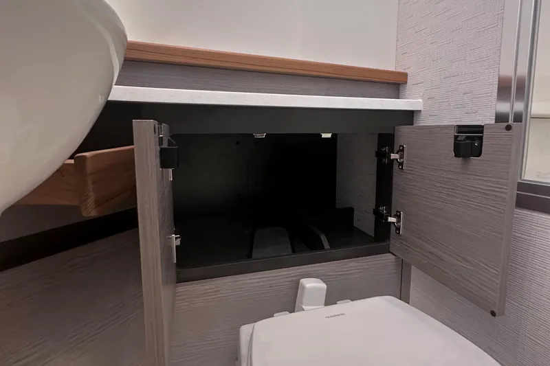 Slide: The Image of Modern bathroom cabinet in 2024 Tiara Yachts 48 LS. - 25