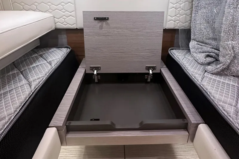 Slide: The Image of Under-seat storage compartment in 2024 Tiara Yachts 48 LS. - 28