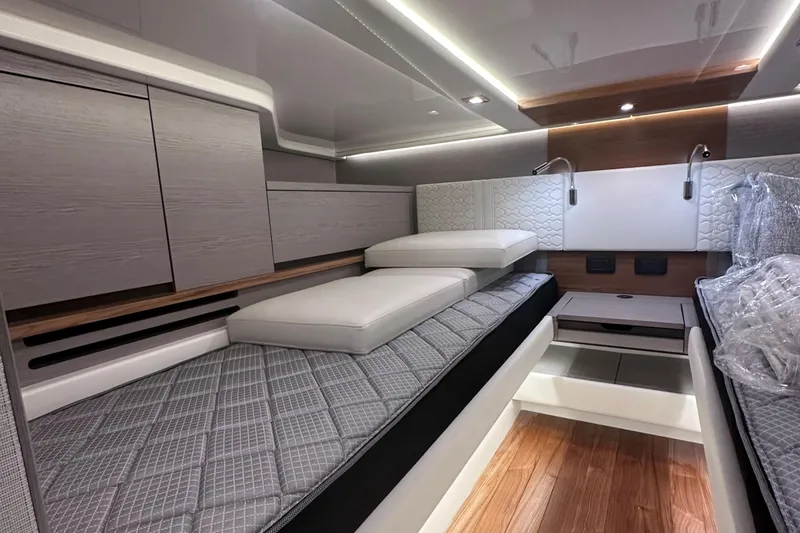 Slide: The Image of Luxurious interior cabin of 2024 Tiara Yachts 48 LS with modern design and comfortable bedding. - 31