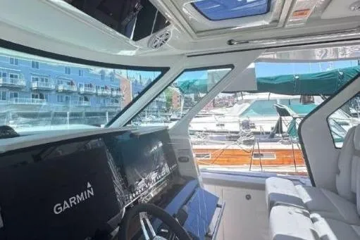 Slide: The Image of Interior view of 2024 Tiara Yachts 48 LS with Garmin navigation system. - 37