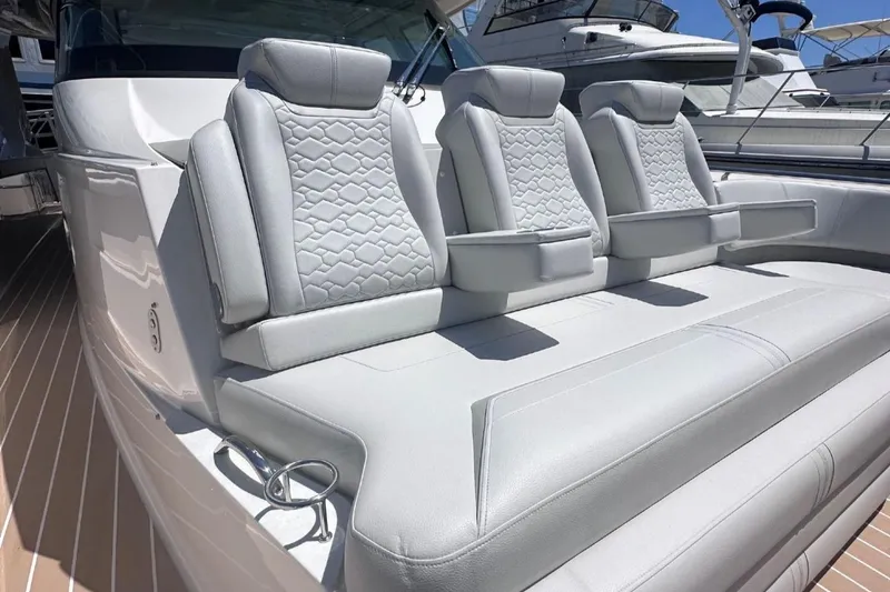 Slide: The Image of 2024 Tiara Yachts 48 LS luxury seating with modern design and premium upholstery. - 39