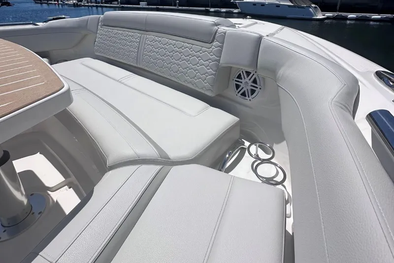 Slide: The Image of Luxurious seating area on the 2024 Tiara Yachts 48 LS, featuring premium upholstery. - 40