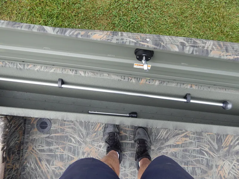 Slide: The Image of Interior view of 2024 Polar Kraft SPORT X 190 CC boat showing storage compartment. - 11