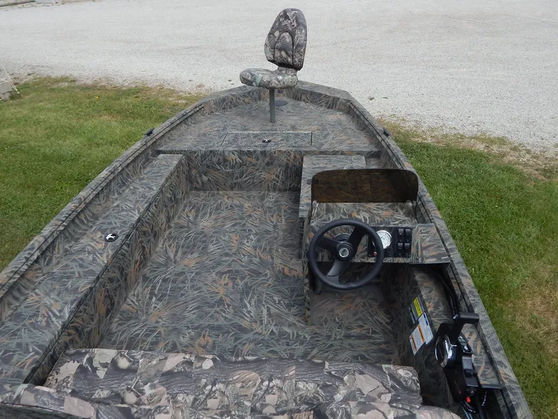 Slide: The Image of 2024 Polar Kraft SPORT X 190 CC boat interior with camouflage design. - 13