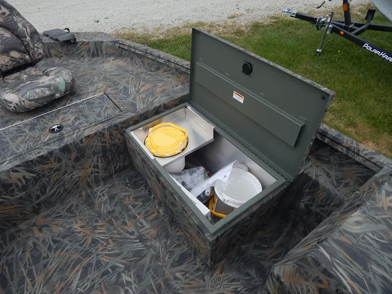 Slide: The Image of Open storage compartment on 2024 Polar Kraft SPORT X 190 CC boat. - 4