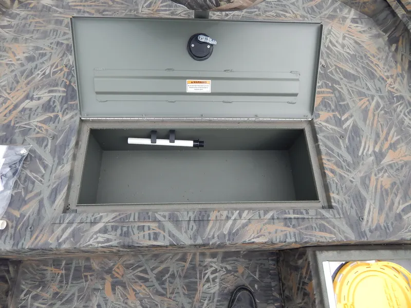 Slide: The Image of Open storage compartment on 2024 Polar Kraft SPORT X 190 CC boat. - 8