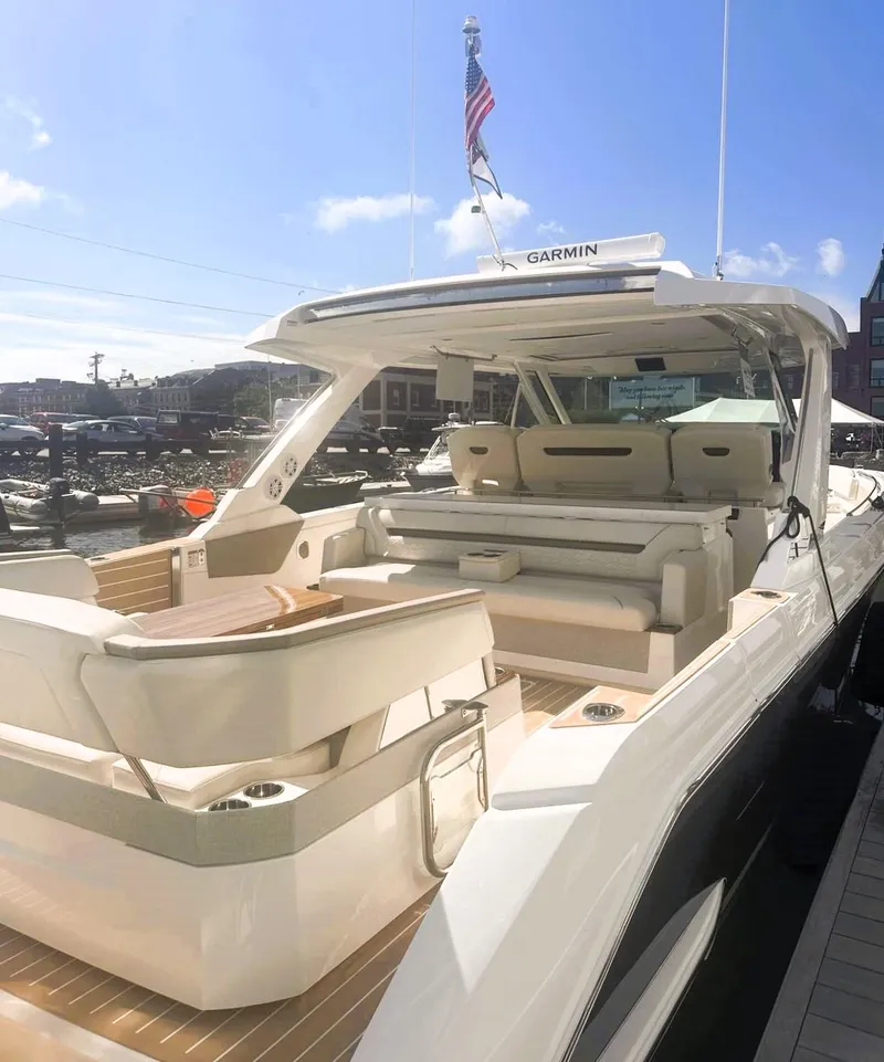 Slide: The Image of 2024 Tiara Yachts 43 LS luxury boat with spacious seating and modern design. - 19