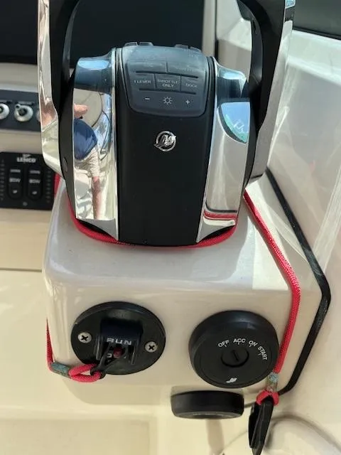 Slide: The Image of Close-up of 2018 Boston Whaler 270 Vantage boat throttle controls. - 10
