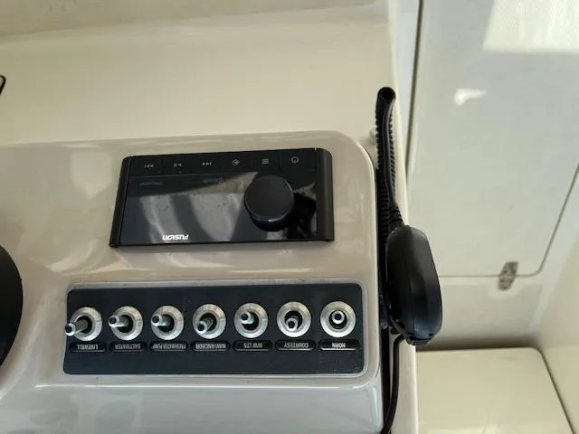 Slide: The Image of Control panel of a 2018 Boston Whaler 270 Vantage boat. - 13