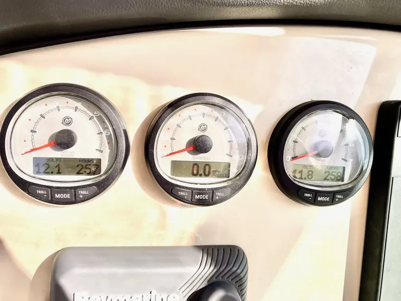 Slide: The Image of Close-up of 2018 Boston Whaler 270 Vantage boat dashboard gauges. - 16