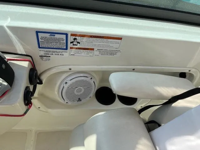 Slide: The Image of Boston Whaler 270 Vantage 2018 boat interior with speaker and seating. - 23