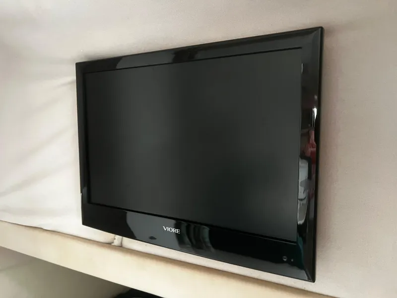 Slide: The Image of Interior stairs of a 1997 Formula 34 PC boat, leading to the deck. - 11