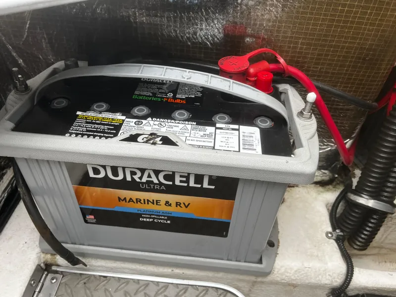 Slide: The Image of Twin engines in a 1997 Formula 34 PC boat, showcasing detailed mechanical components. - 19