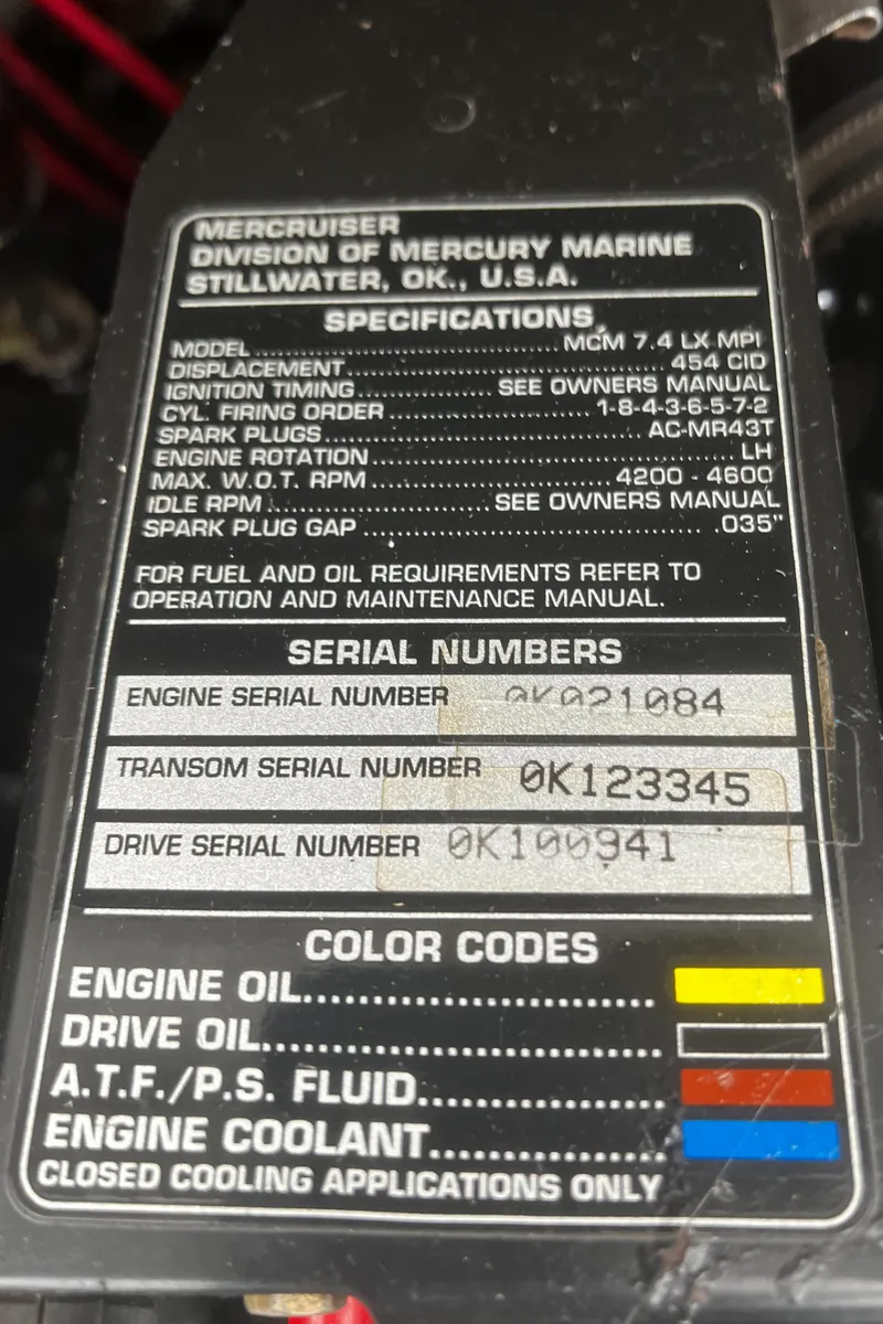 Slide: The Image of Oil pressure gauge in a 1997 Formula 34 PC boat dashboard. - 22