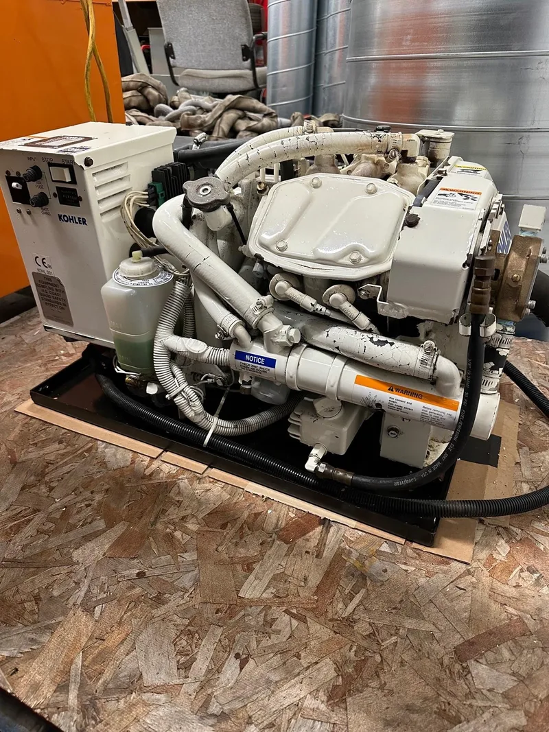 Slide: The Image of 1997 Formula 34 PC engine on display, featuring complex piping and components. - 24