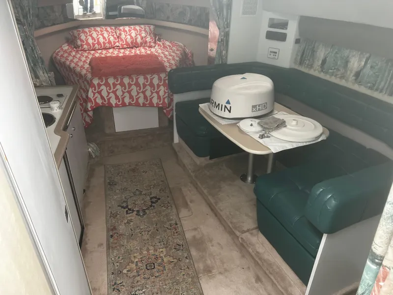 Slide: The Image of 1997 Formula 34 PC boat dashboard with logo and sleek design. - 8