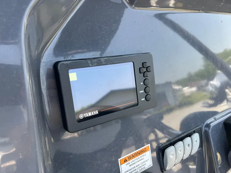 Slide: The Image of Yamaha display on 2023 Zodiac Open 5.5 boat dashboard. - 13