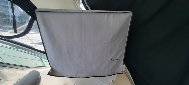 Slide: The Image of 2008 Sea Ray 350 Sundancer interior with window cover. - 13