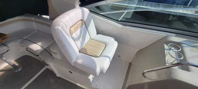Slide: The Image of Captain's seat on a 2008 Sea Ray 350 Sundancer boat. - 15