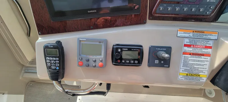 Slide: The Image of Control panel of a 2008 Sea Ray 350 Sundancer boat with various instruments. - 17