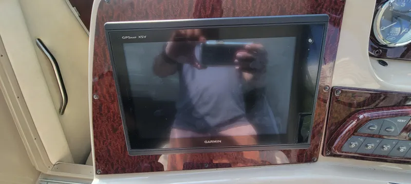 Slide: The Image of Garmin GPS display on 2008 Sea Ray 350 Sundancer boat dashboard. - 19