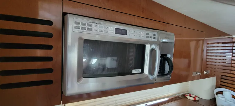 Slide: The Image of Built-in microwave in the 2008 Sea Ray 350 Sundancer yacht kitchen. - 29