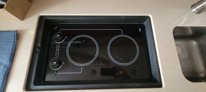 Slide: The Image of Built-in stovetop on 2008 Sea Ray 350 Sundancer yacht kitchen counter. - 30