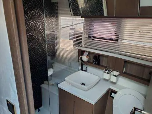 Slide: The Image of Modern bathroom in 2020 Galeon 500 Fly yacht with sleek design and amenities. - 15