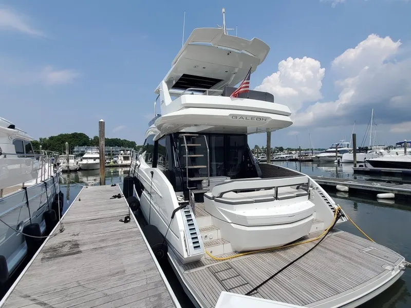 Slide: The Image of Galeon 500 Fly 2020 yacht docked at marina on a sunny day. - 2